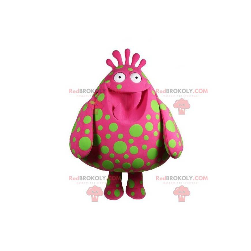 Großes rosa Monstermaskottchen mit grünen Punkten -