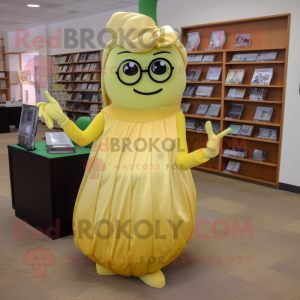 Gold Zucchini mascot costume character dressed with a Midi Dress and Reading glasses