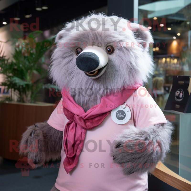 Pink Sloth Bear mascot costume character dressed with a Button-Up Shirt and Shawl pins