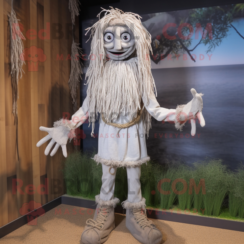 Silver Scarecrow mascot costume character dressed with a Capri Pants and Bracelets Silver Scarecrow mascot costume character dressed with a Capri Pants and Bracelets