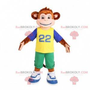Mascota mono marrón vestida con un traje colorido -