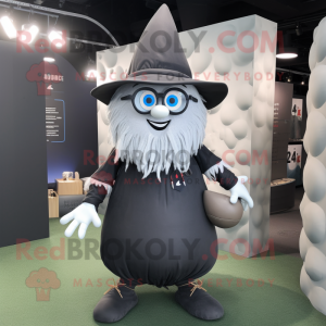 Gray Witch'S Hat mascot costume character dressed with a Rugby Shirt and Eyeglasses