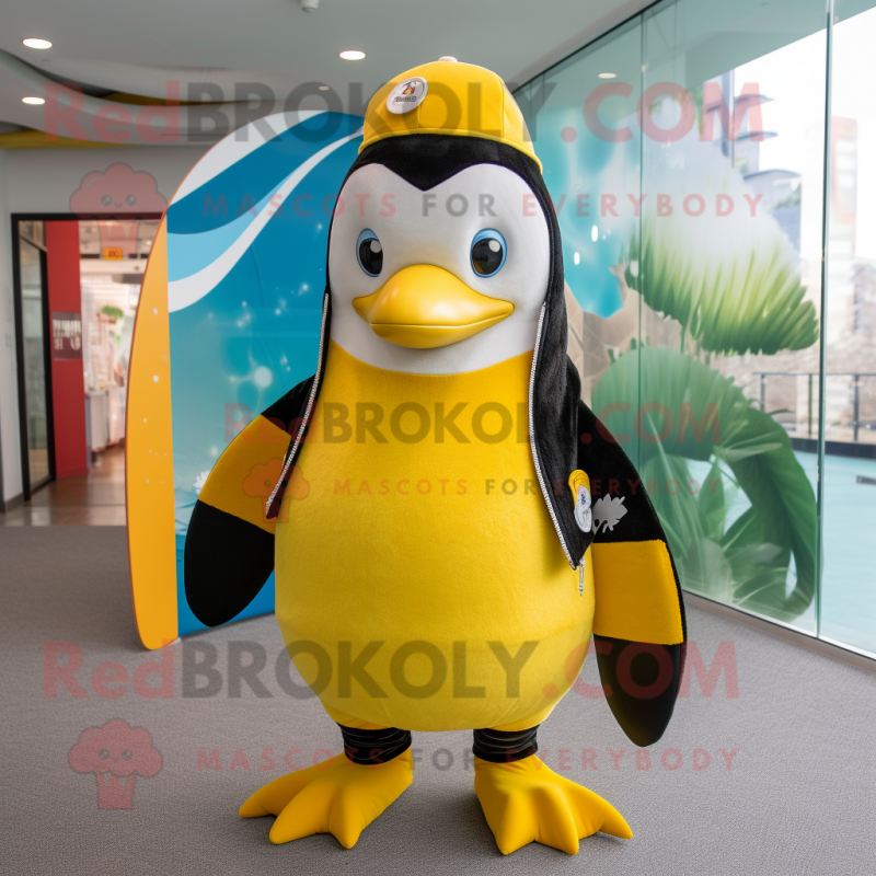 Yellow Penguin mascot costume character dressed with a Rash Guard and Beanies