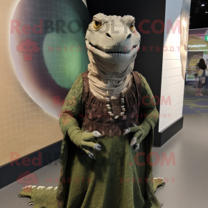 Olive Komodo Dragon mascot costume character dressed with a Maxi Skirt and Keychains