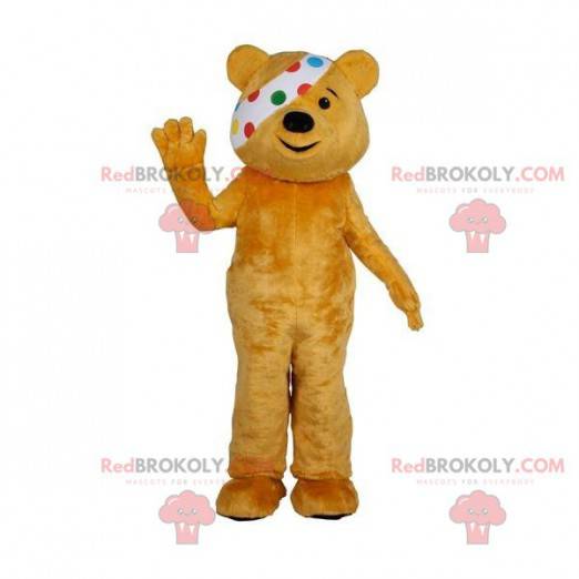 Brown teddy bear mascot with an eye patch - Redbrokoly.com