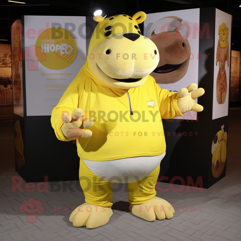 Yellow Hippopotamus mascot costume character dressed with a Henley Tee and Rings Yellow Hippopotamus mascot costume character dressed with a Henley Tee and Rings