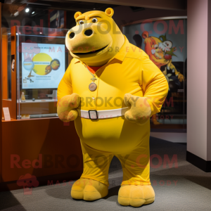 Yellow Hippopotamus mascot costume character dressed with a Henley Tee and Rings