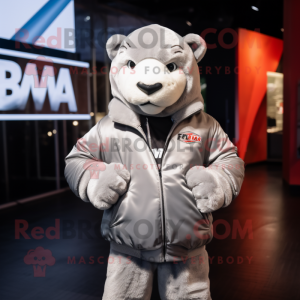 Silver Puma mascot costume character dressed with a Windbreaker and Beanies