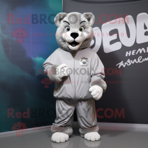 Silver Puma mascot costume character dressed with a Windbreaker and Beanies