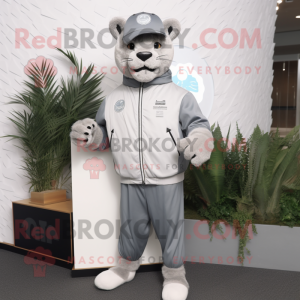 Silver Puma mascot costume character dressed with a Windbreaker and Beanies