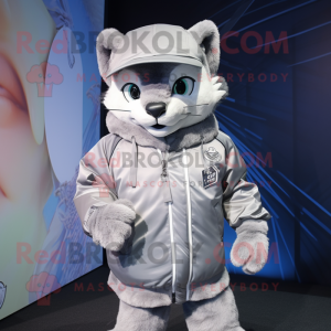 Silver Puma mascot costume character dressed with a Windbreaker and Beanies