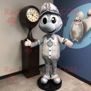 Silver Hourglass mascot costume character dressed with a Baseball Tee and Tie pins