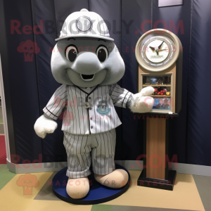 Silver Hourglass mascot costume character dressed with a Baseball Tee and Tie pins