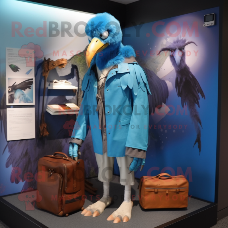 Blue Vulture mascot costume character dressed with a Raincoat and Briefcases