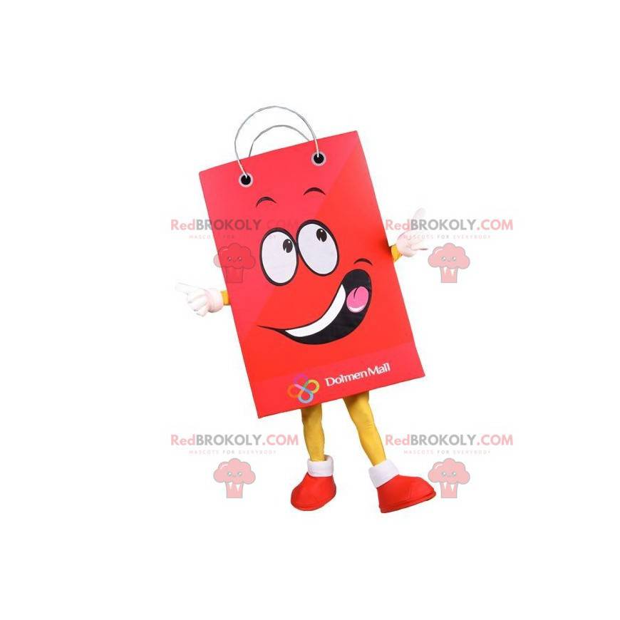 Mascote gigante do saco de papel. Sacola de compras vermelha -