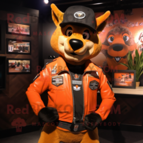 Orange Dingo mascot costume character dressed with a Leather Jacket and Berets