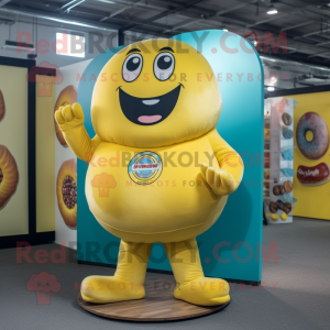 Yellow Donut mascot costume character dressed with a Rash Guard and Lapel pins