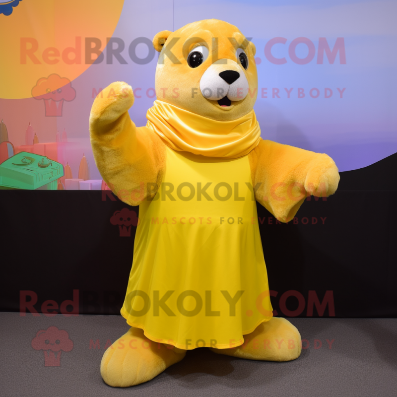 Yellow Sea Lion mascot costume character dressed with a Skirt and Mittens Yellow Sea Lion mascot costume character dressed with a Skirt and Mittens