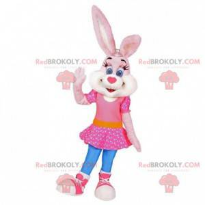 Mascota de conejo rosa y blanco con un vestido rosa -