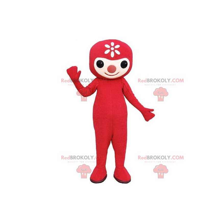 Mascotte de bonhomme rouge avec une fleur sur la tête -