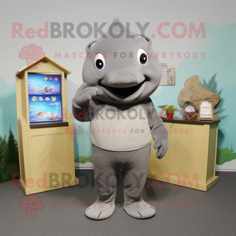 Gray Stingray mascot costume character dressed with a Sweater and Coin purses Gray Stingray mascot costume character dressed with a Sweater and Coin purses