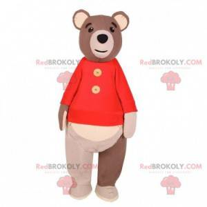 Mascote grande urso pardo com um suéter vermelho -