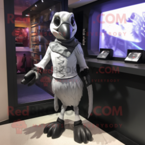 Silver Crow mascot costume character dressed with a Jeggings and Clutch bags