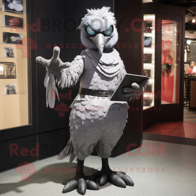 Silver Crow mascot costume character dressed with a Jeggings and Clutch bags Silver Crow mascot costume character dressed with a Jeggings and Clutch bags
