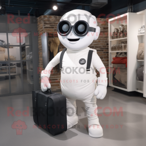 White Cyclops mascot costume character dressed with a Overalls and Briefcases