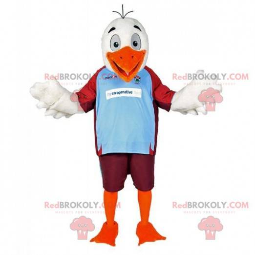 Witte en oranje zeemeeuwvogelmascotte in sportkleding -