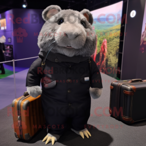 Black Guinea Pig mascot costume character dressed with a Jeggings and Briefcases