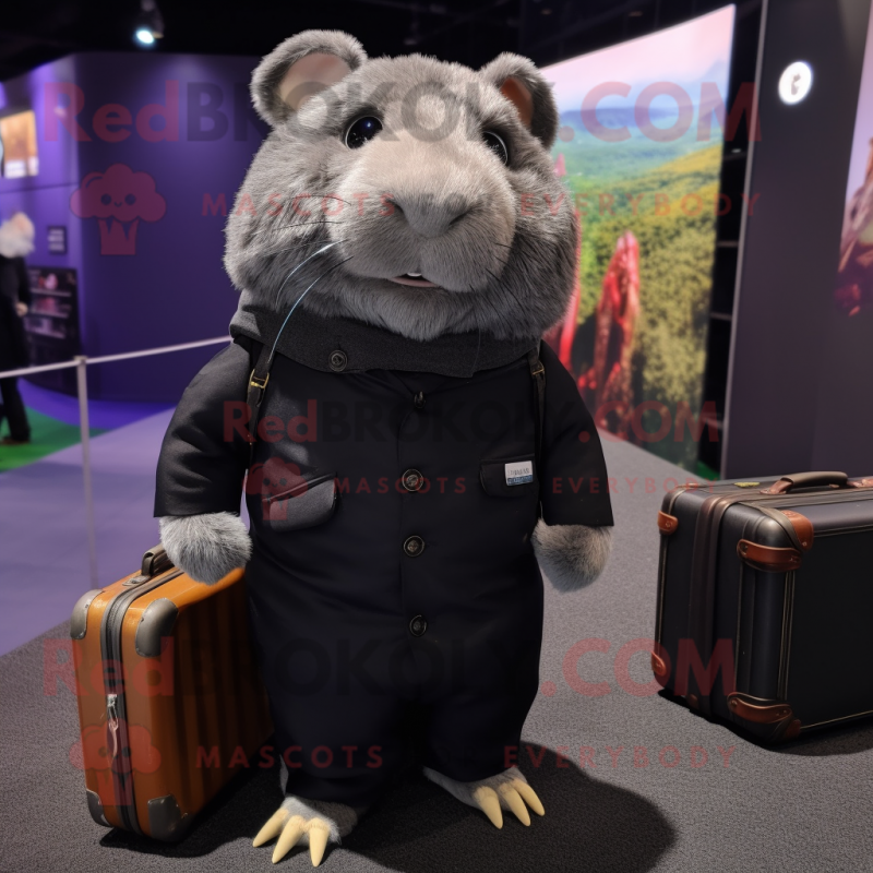 Black Guinea Pig mascot costume character dressed with a Jeggings and Briefcases Black Guinea Pig mascot costume character dressed with a Jeggings and Briefcases