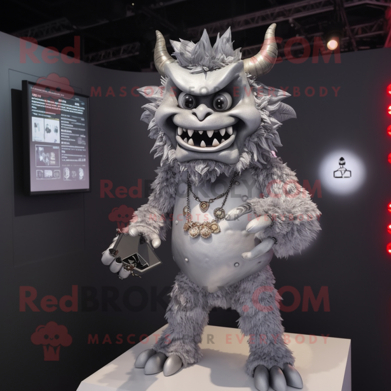 Silver Demon mascot costume character dressed with a Blouse and Digital watches Silver Demon mascot costume character dressed with a Blouse and Digital watches
