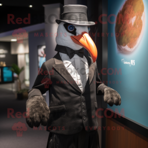 Black Albatross mascot costume character dressed with a Waistcoat and Hats