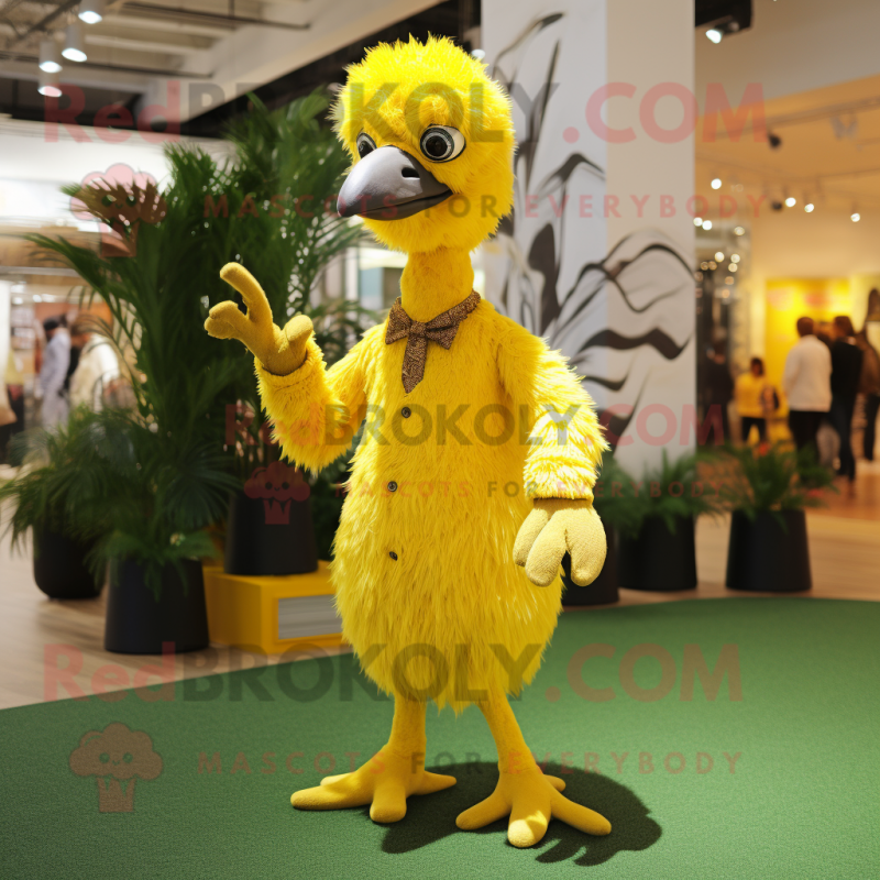 Yellow Ostrich mascot costume character dressed with a Trousers and Brooches Yellow Ostrich mascot costume character dressed with a Trousers and Brooches