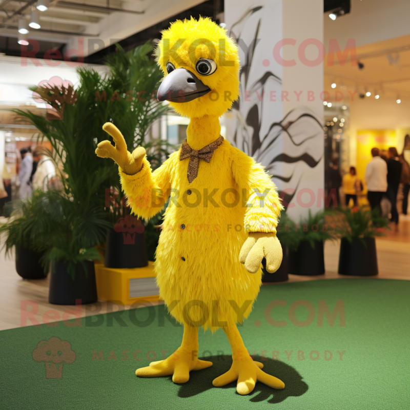 Yellow Ostrich mascot costume character dressed with a Trousers and Brooches