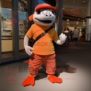 Orange Salmon mascot costume character dressed with a Bermuda Shorts and Belts