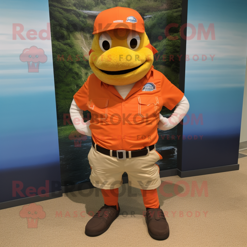 Orange Salmon mascot costume character dressed with a Bermuda Shorts and Belts