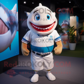 White Tuna mascot costume character dressed with a Rugby Shirt and Caps