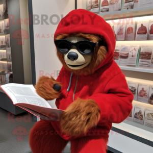 Red Sloth mascot costume character dressed with a Cover-up and Reading glasses