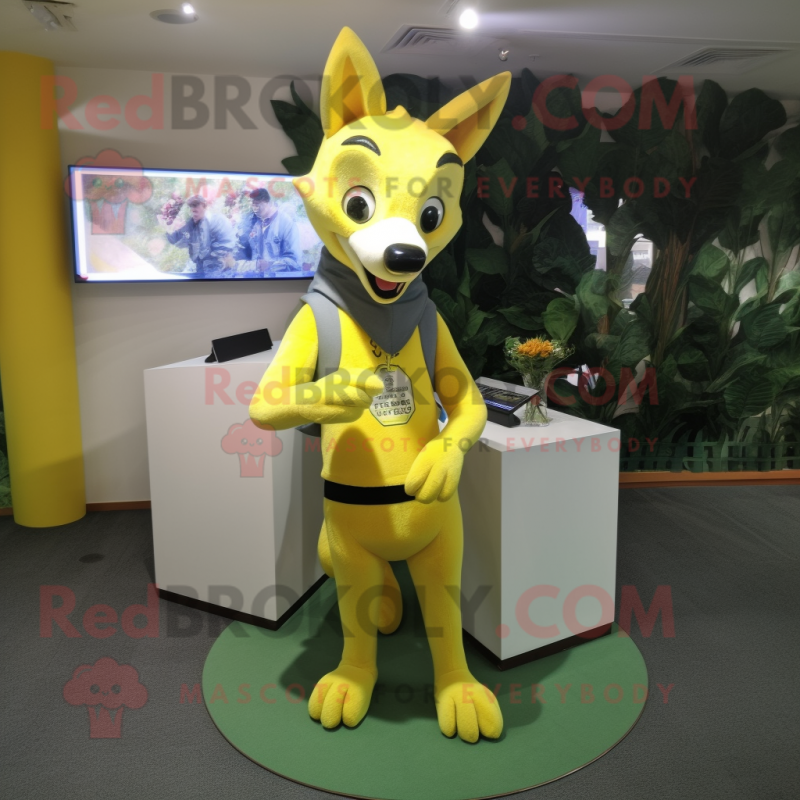 Lemon Yellow Dingo mascot costume character dressed with a Leggings and Headbands