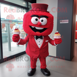 Red Cupcake mascot costume character dressed with a Suit Jacket and Clutch bags