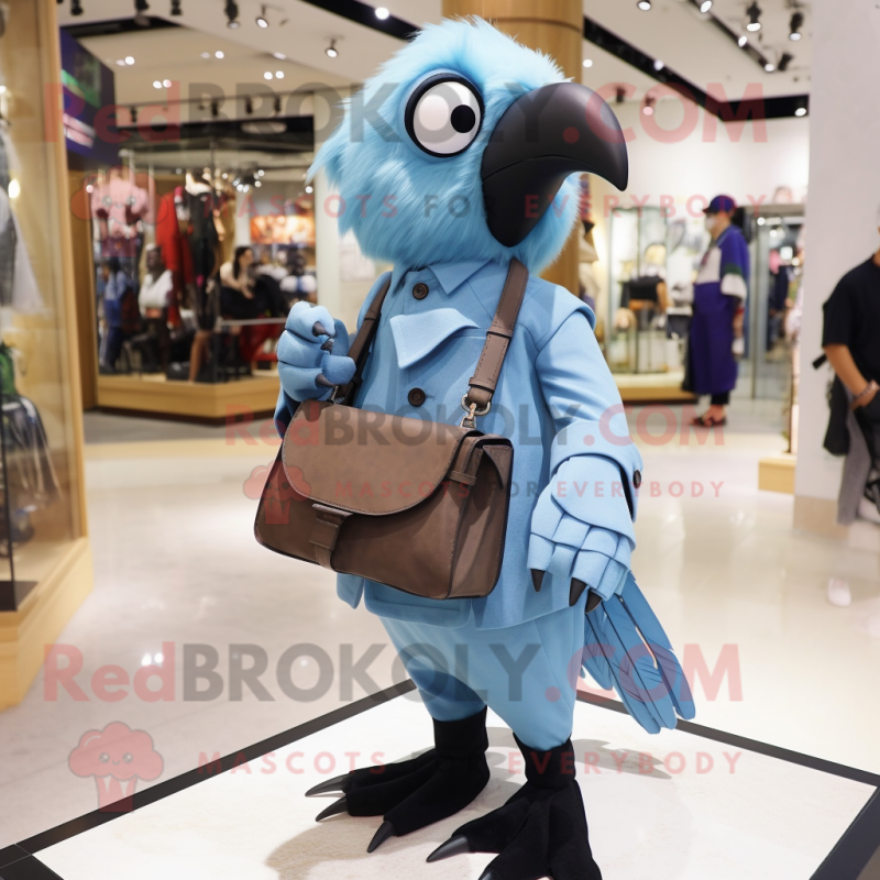 Sky Blue Crow mascot costume character dressed with a Poplin Shirt and Messenger bags