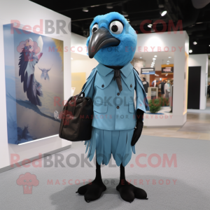 Sky Blue Crow mascot costume character dressed with a Poplin Shirt and Messenger bags