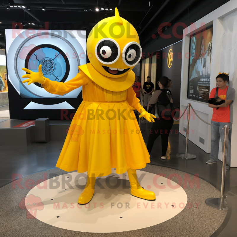 Yellow Cyclops mascot costume character dressed with a Circle Skirt and Watches Yellow Cyclops mascot costume character dressed with a Circle Skirt and Watches