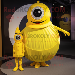 Yellow Cyclops mascot costume character dressed with a Circle Skirt and Watches