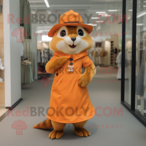 Orange Chipmunk mascot costume character dressed with a Shift Dress and Hat pins