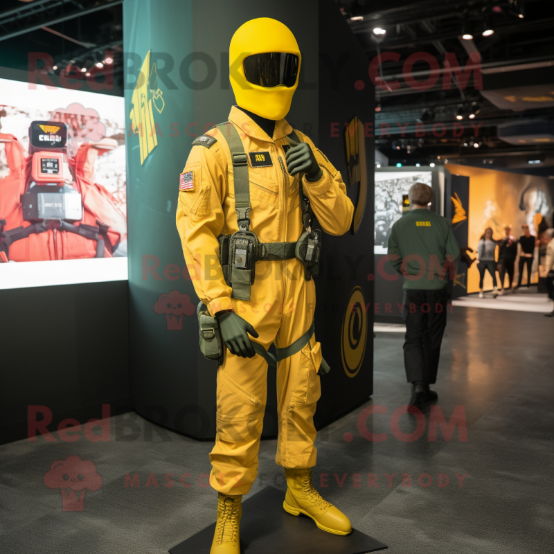 Yellow Gi Joe mascot costume character dressed with a Cargo Pants and Lapel pins Yellow Gi Joe mascot costume character dressed with a Cargo Pants and Lapel pins
