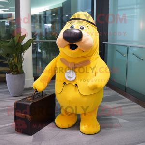 Yellow Walrus mascot costume character dressed with a Suit Pants and Keychains