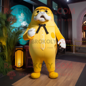 Yellow Walrus mascot costume character dressed with a Suit Pants and Keychains